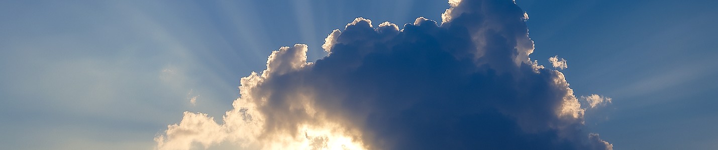 “Heavenly light breaking through clouds representing divine communication”